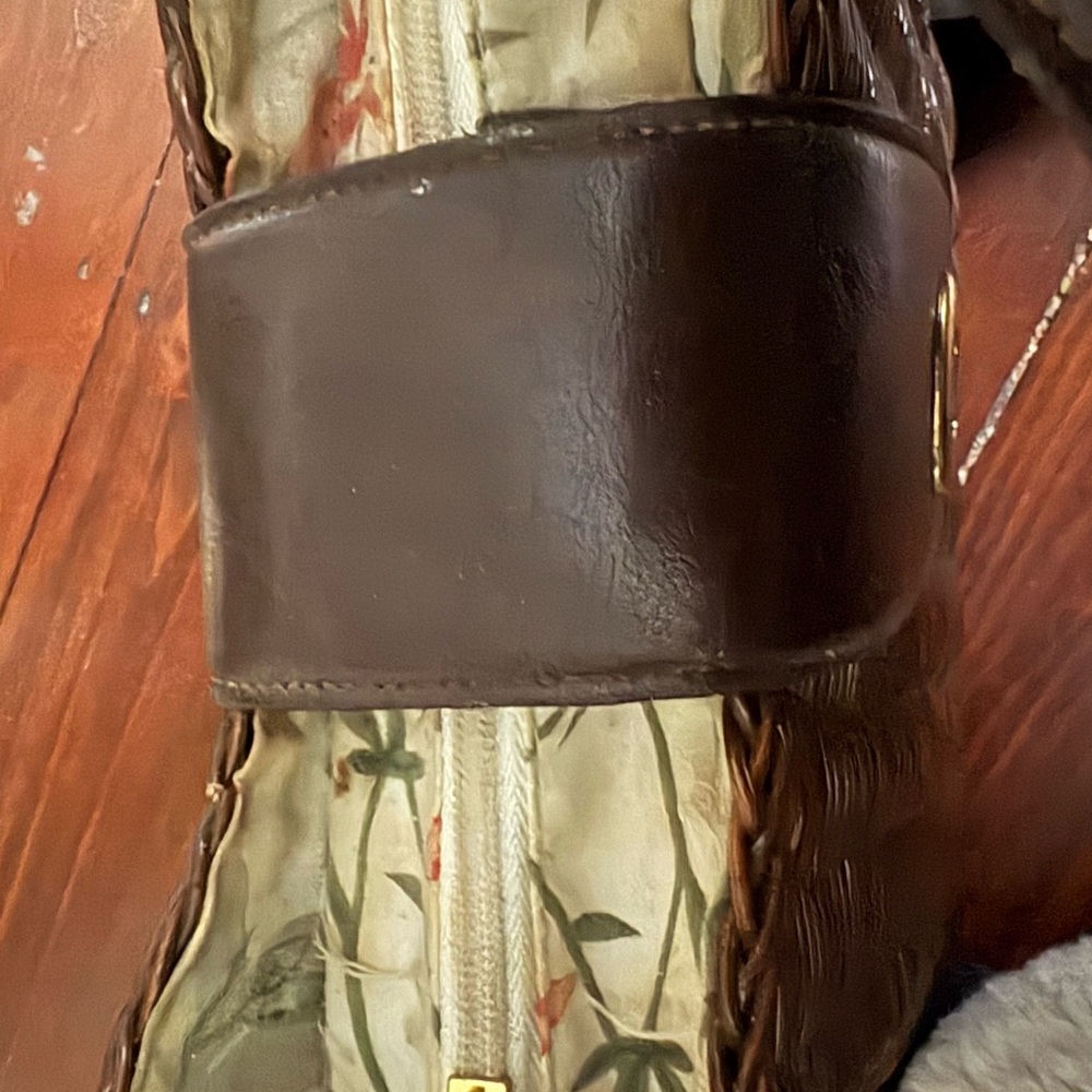 Elegant Brown wicker purse with leather accents. Classic yet unique